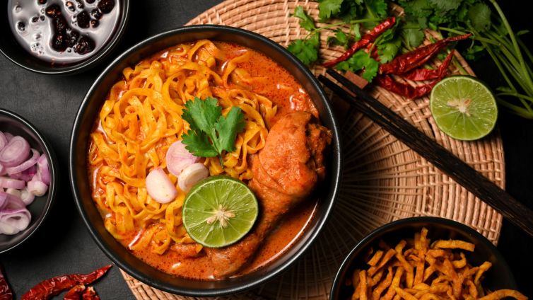 Top view, Khao Soi Kai, Creamy spicy yellow curry soup with chicken